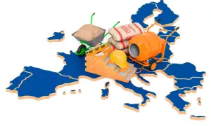 Mapa Europy z materiałami budowlanymi: cement, betoniarka, taczka, cegły, kask.
